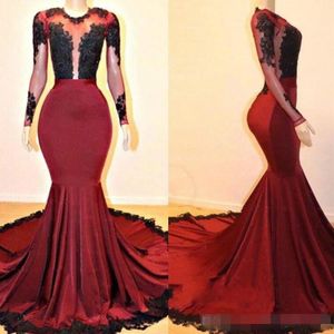 2019 Mörkröd Mermaid Prom Klänningar Långärmade Svart Lace Appliqued Sheer Neck Illusion Sexigt Formellt Occidage Wear Evening Party Gown