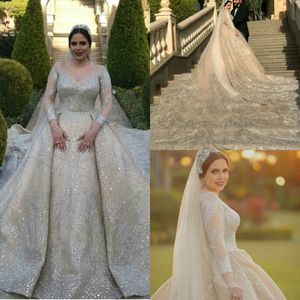 Glitter Bröllopsklänningar Jewel Sheer Långärmade Snören Lace Appliqued Beaded Crystal Bridal Gown Court Train Custom Made Robes de Mariée Hot Sell