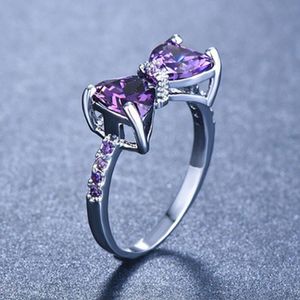 Hot Sälj Silver Filled Sparkling Four-Claw Purple Bow Knot Stackbara Ring för Kvinnor Micro Pave Cz Alla hjärtans dag Presentsmycken