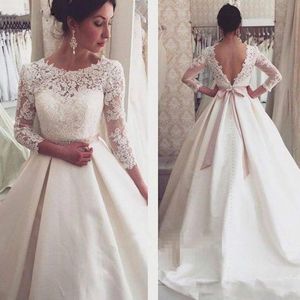 Verão A linha de vestidos de casamento Jewel Neck Lace apliques de manga comprida vestidos de noiva sem encosto Trem da varredura Vestido de Noiva Vestios De Novia