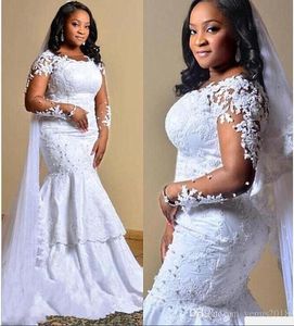 Abiti da sposa taglie forti modesti Applicazioni dell'Africa saudita Perline Abiti da sposa a sirena con illusione Abiti da sposa vintage a maniche lunghe con collo gioiello