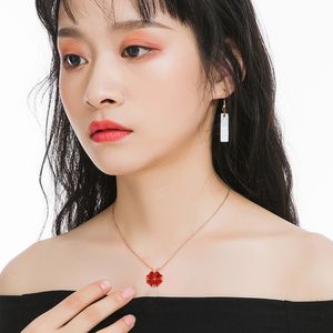 Korean version four leaf grass Necklace love splicing folding pendant Rose Gold Lock bone chain full of Diamond Red Necklace