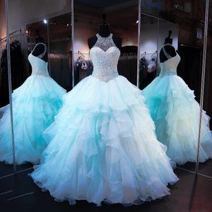 Ruffled Organza kjol quinceanera klänningar 2018 med pärla pärlor bodice sheer high neck spets upp backless ljus himmel blå prom puffy boll klänning