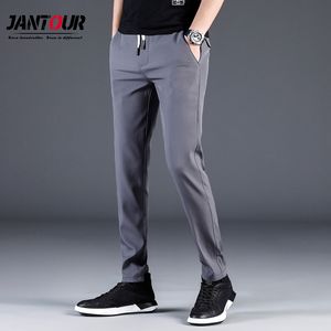 Letnie spodnie męskie Skinny Stretch koreańskie spodnie na co dzień Slim Fit Chino w pasie Jogger Dress spodnie męskie wodoodporne cienkie