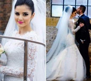 Eleganti abiti da sposa a sirena in pizzo 2019 con maniche lunghe con scollo gioiello e svasatura cappella treno abiti da sposa tromba su misura