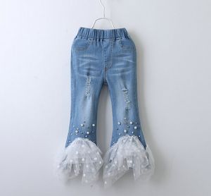Мода дети отверстие джинсы девушки из бисера сращивания горошек кружева тюль брюки дети двойной карман эластичный принцесса брюки F3639