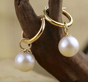 Affascinanti orecchini di perle rotonde bianche del Mare del Sud da 10-11 mm in oro 14k