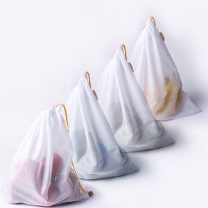 10pcs / lote de prémios reutilizáveis ​​Corda malha produzir sacos cozinha Frutas Brinquedos vegetais sacos de armazenamento bolsa com cordão de malha saco de compras