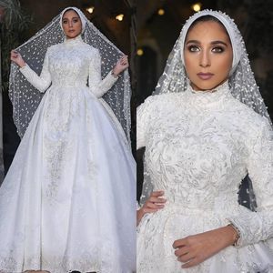 Muzułmańskie suknie ślubne Wysokiej szyi z długim rękawem Koronki Aplikacje Koraliki Plus Size Suknia Balowa Kaplica Suknie ślubne Caftan Szata De Mariée