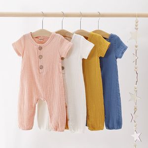 Estate Bambino Neonato Neonato Ragazze Tute Abbigliamento Bambini Tuta Cotone Lino Manica corta Bottone Tinta unita Pagliaccetto Vestiti M1502