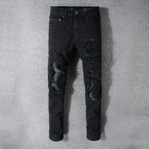 męskie markowe dżinsy spodnie jeansowe klasyczne czarne spodnie białe pour hommes ripped moto biker rock jean