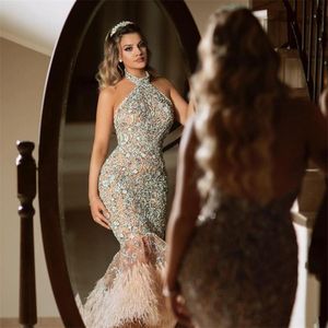 Halter Neck Arabic Mermaid Prom Dresses Sleevelss Lace Beaded Formal Evening Gowns Backless Sequined Feathers robes de soirée