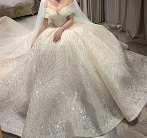 Sparkly Ball Gowns Bröllopsklänningar Sequins Off Shoulder Lace-up Back Bridal Gowns Dubai Arabiska Bröllopsklänning Robes de Mariée