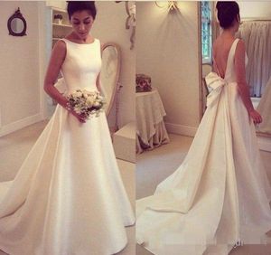 2019 Chic Ivory A Line Wedding Suknie Satin Backless Big Bow Chapel Train Custom Made Weding Bride Gown Robes de Mariée