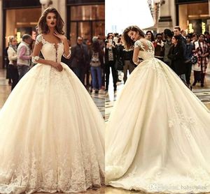 Ny design arabisk dubai plus storlek eleganta bollklänningar klänningar rena halvärmar applikationer djup v hals bröllopsklänning brudklänningar