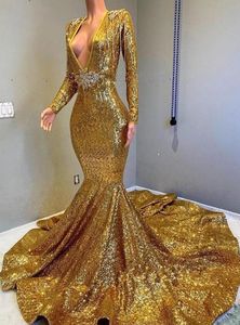 2019 Gold Sparkling Long Sleeves Sequined Mermaid Prom Dresses Deep V Neck Beaded Stones Backless Sweep Train Party Evening Gowns