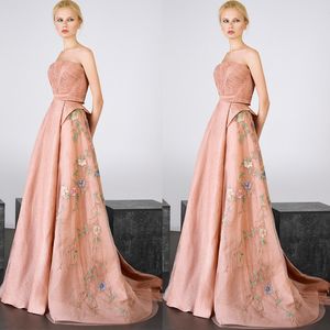 Eleganckie sukienki wieczorowe bez ramiączek Unikalny design Rękawy Dwa kawałki Prom Suknie Długość Piętra Aplikacja Kobiety Sukienki