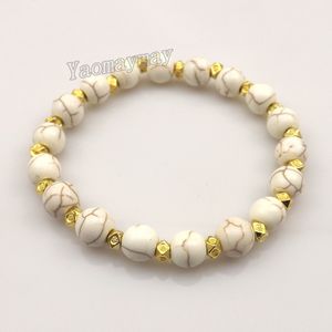 Nuovi arrivano i braccialetti di turchese bianco da 8 mm con perline distanziatrici color oro per le donne 12 pezzi Spedizione gratuita