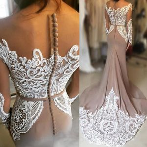 Sheer Long Sleeves Mermaid Prom Dresses 2019 Spring Summer Lace Appliques Back Covered Buttons Evening Gowns Saudi Arabia Women Formal Wear