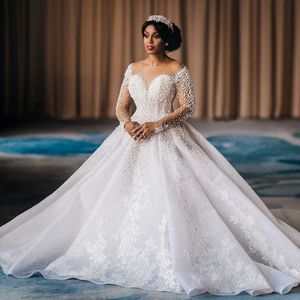 2020 Plus Size Arabic Aso Ebi Sparkly Luxurious Sexy Wedding Dresses Pearls Crystals Lace Bridal Dresses Sheer Neck Wedding Gowns ZJ356