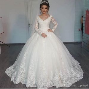 Abiti da sposa sexy bianchi splendidi con abiti da ballo trasparenti Abiti da sposa in pizzo gonfio con perline Abiti da sposa bianchi a maniche lunghe con linea A robe de mariage