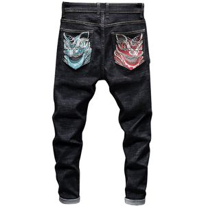 nuovi jeans elasticizzati neri autunnali pantaloni da uomo in denim hip-hop di alta qualità con ricamo testa di fantasma di colore primario sottile