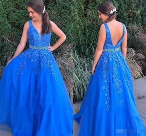 Royal Blue Red Prom klänningar Deep PUMGING Sheer V Neck Beading Crystal Midje golvlängd Lace Applique Evening Gown Graduation Party