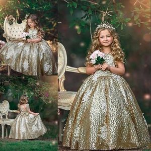 Abiti da ragazza di fiore con paillettes dorate scintillanti per abiti da spettacolo con applicazioni di pizzo da sposa Abito da ballo per bambini senza schienale con lunghezza al pavimento