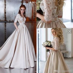 2024 1/2 långa ärmar Champagne Gold Prom Dresses Lace Applique Jewel Sheer Neck Illusion Bodice Formella kvällsfestklänningar 403 403