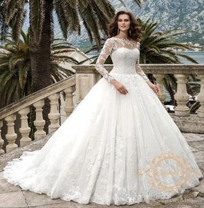 Najnowsza suknia balowa Suknie ślubne Sheer Neck Lace Aplikacje z długim rękawem Illusion Dubai Arabskie Skromne Suknie Ślubne Vestidos de Novia