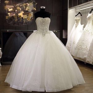 Gratis frakt Real Image Ball Gown Sweetheart Ivory Organza Modest Lace Up Luxury Wedding Dresses Crystal Line