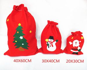 Sacchetto del regalo di Natale di nuovo arrivo all'ingrosso Migliore qualità Colore rosso non tessuto Dimensioni grandi 40 * 60 cm Borse di Babbo Natale Trasporto di goccia 200 pz / lotto