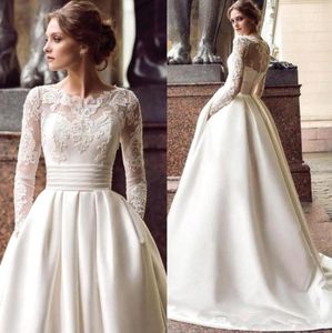 2020 Nowy Elegancki Niesamowite Sukienki ślubne Ivory Satynowe Luksusowe Koronki Appliqued Bateau Długie Rękawy Plus Size Bridal Gown Vestios de Novia