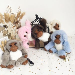 Vera pelliccia genuina scimmia portachiavi giocattolo pompon palla borsa fascino ciondolo telefono regalo