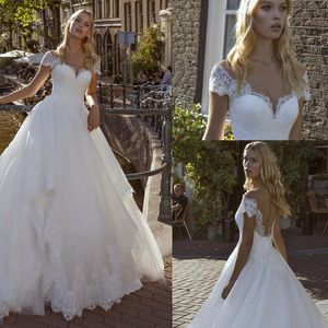 Vestidos De Novia Lace Appliqeus Sweetheart Cap Krótkie Rękawy Backless Linia Suknie Ślubne Długość Piętro Tulle Suknia Ślubna Suknia