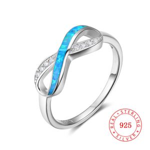 中国純正925スターリングシルバーリングエンドレス愛無限の女性のギフト高品質青い火災オパール無限のデザインの婚約指輪
