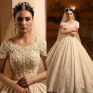 Arabic 2020 Luxurious Sexy Wedding Dresses Portrait Beaded Pearls Ball Gown Bridal Dresses Lace Appliqued Stunning Wedding Gowns
