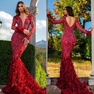 Luxury Red Mermaid Evening Dresses V Neck Beaded Feather Long Sleeves Prom Dress Ruffle Open Back Sweep Train Formell Party Gown