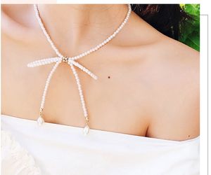 ファッション風の春と夏のネックレスの真珠の真珠の弓休暇の風のネックレスシンプルな気質ビーチネックレスパーティーBi