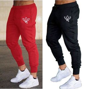 Męskie spodnie do biegania nowe markowe spodnie sportowe ze sznurkiem Fitness Workout odzieć obcisłe spodnie dresowe odzież codzienna modne spodnie Plus rozmiar M-2XL