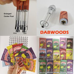 Hottest Dabwoods Vape Cartridges 1 ml 0,8 ml Leere Keramik Coil Holz Drip Tip Glasbehälter mit Verpackung Beutel E-Zigaretten Thick Ölzerstäubungseinrichtung