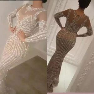 Yousef Aljasmi Luxury Prom Dresses Long Sleeve Sequins Silver Mermaid Sexy Sheer Jewel Neck Evening Wear Beads Special Occasion Dress