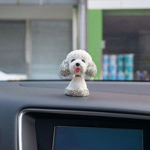 funko pop on car dashboard