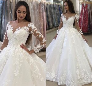 Sheer Neck Långärmad bollklänning Bröllopsklänningar 2021 Saudiarabien Lace Appliqued Bridal Gowns Court Train Dubai Vestidos de Novia Al6782