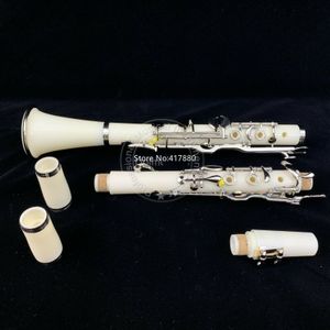 Venta al por mayor de Nueva primera clase G clave clarinete de madera del ébano blancos claves chapados en plata buen material y con sonido caso del envío