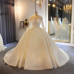 2020 Sparkling Ball Gown Wedding Dresses Sheer Jewel Neck Appliqued Sequins Long Sleeves Lace Bridal Gowns Custom Made Abiti Da Sposa