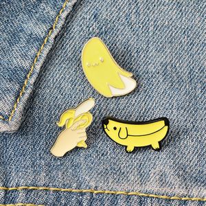 Wholesale enamel yellow resale online - Cartoon Banana Gun Dog brooches yellow Enamel Lapel Pins Clothes Bag Punk Jewelry Gift For Friend