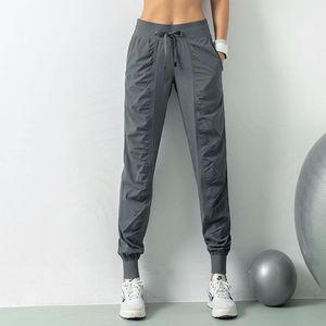 Tatting Fabric Drawstring Running Sport Joggers Women Quick Dry Athletic Gym Fitness Sweatpants with Two Side Pockets