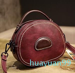 Versione coreana di nuova moda della piccola borsa monospalla rotonda Baitao con borsetta obliqua e borsetta in pelle