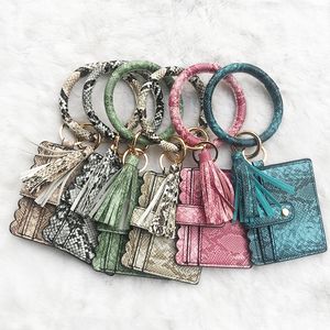 DesignerBag Wristlet Nyckelringar Personliga Kvinnor Ring Armband Korthållare Purse Med Tassel Snakeskin Korn PU Läder Keychain